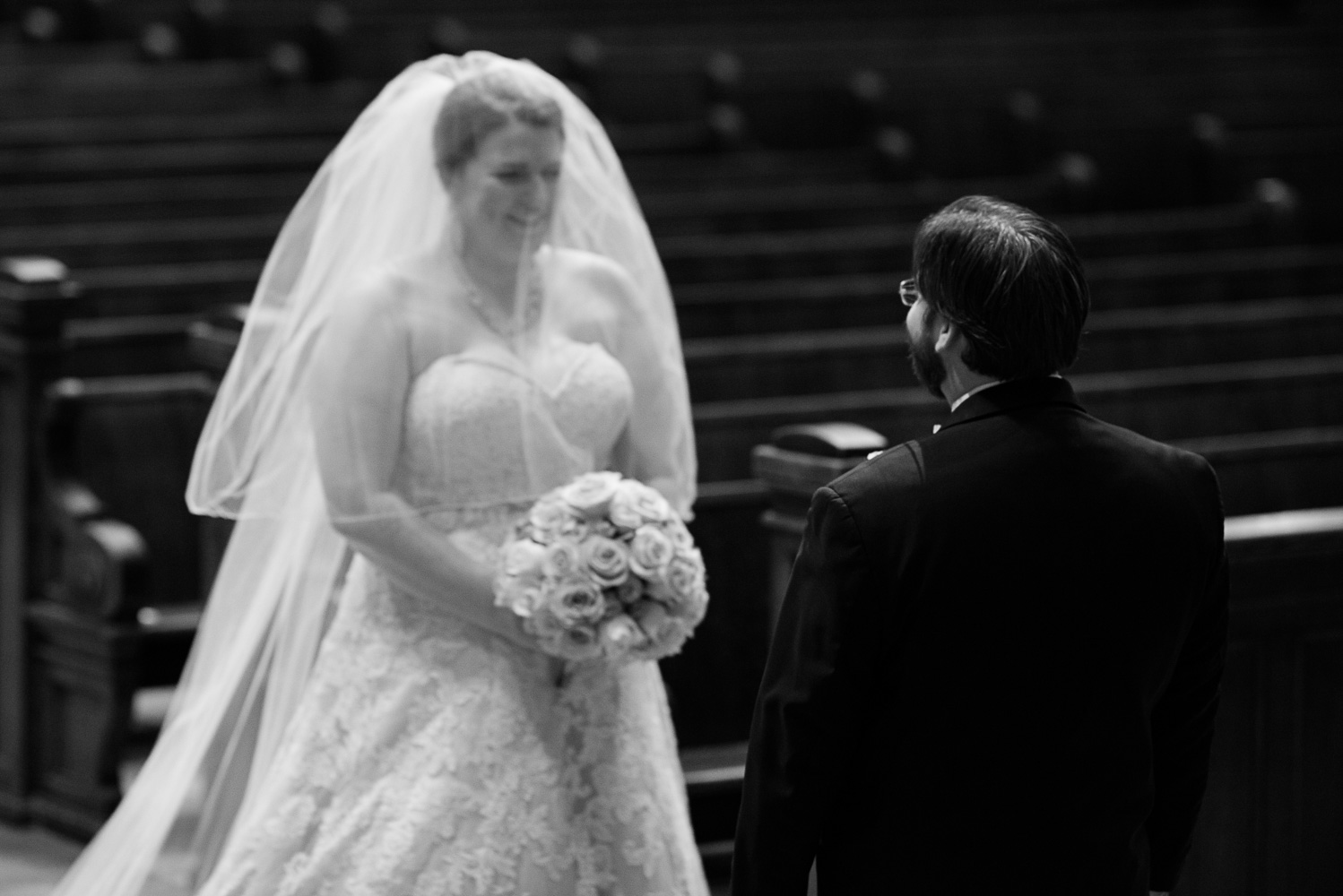 bride seeing groom for the first time on the wedding day at
