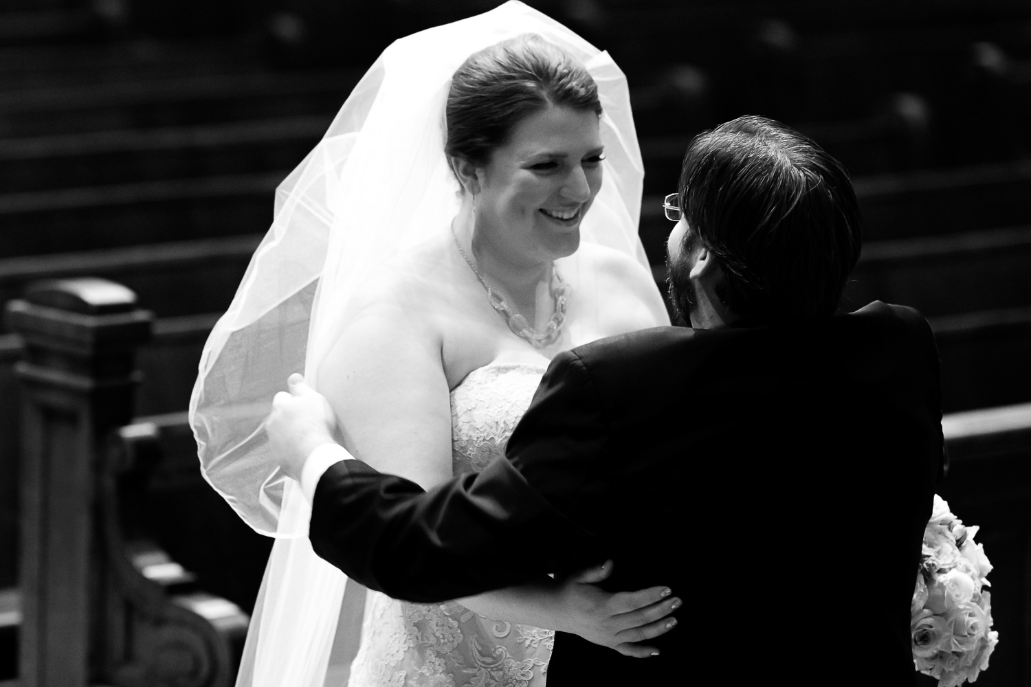 bride and groom during their first look at The Basilica of Saint Mary