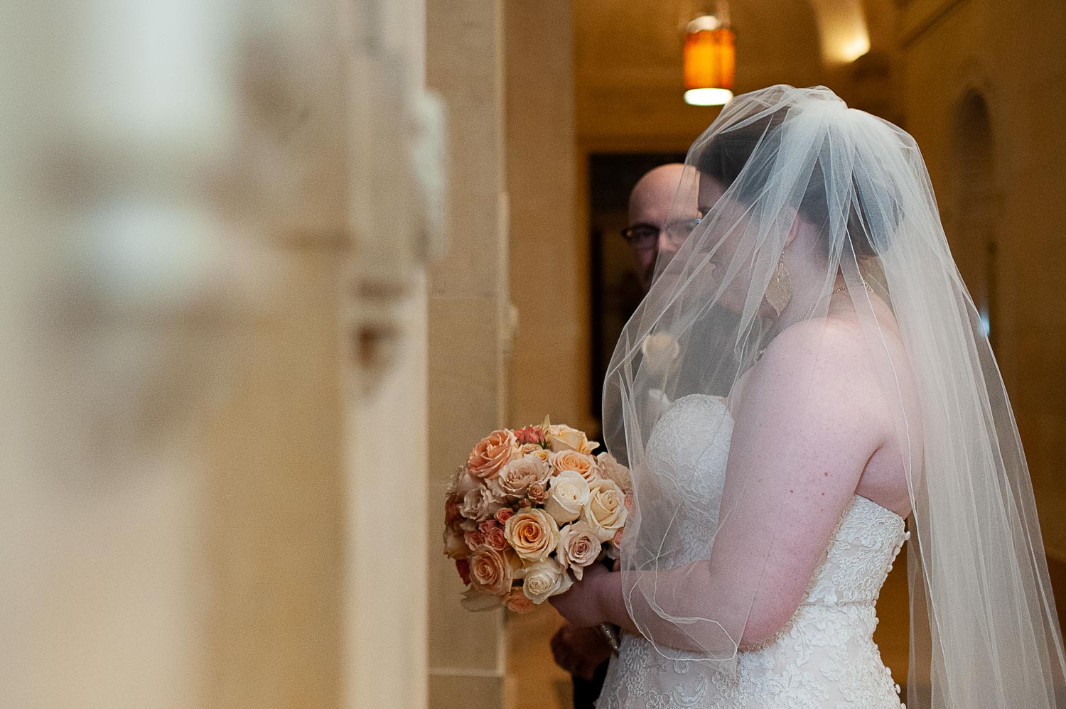 bride and dad getting ready to walk down the aisle at The Basilica of Saint Mary