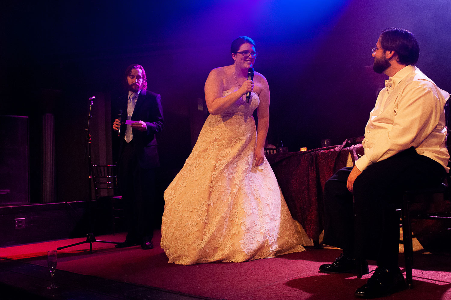 bride singing to the groom during the wedding reception at the Varsity in Minneapolis