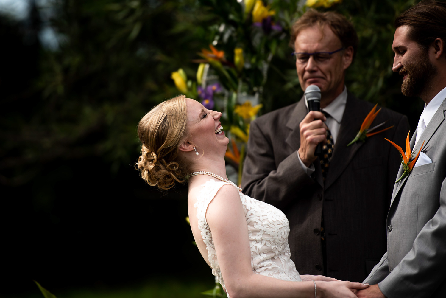 bride laughing during the wedding ceremony