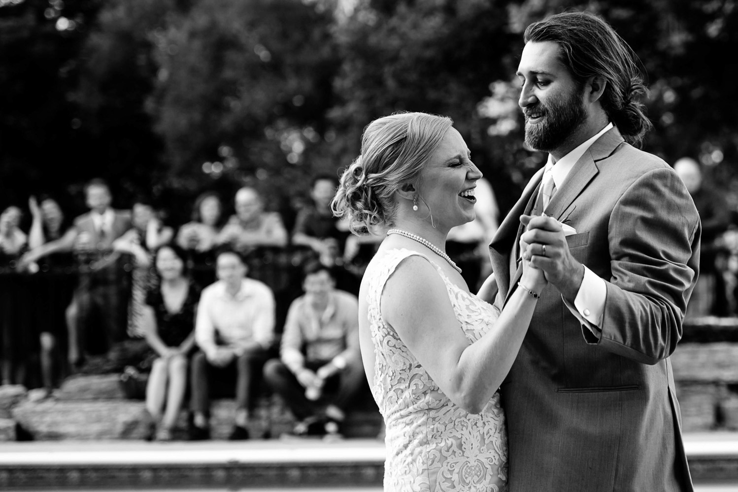 bride singing to the groom during their first dance