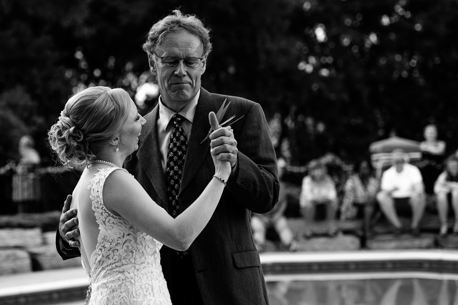 bride dancing with her father at her summer wedding in Minnesota