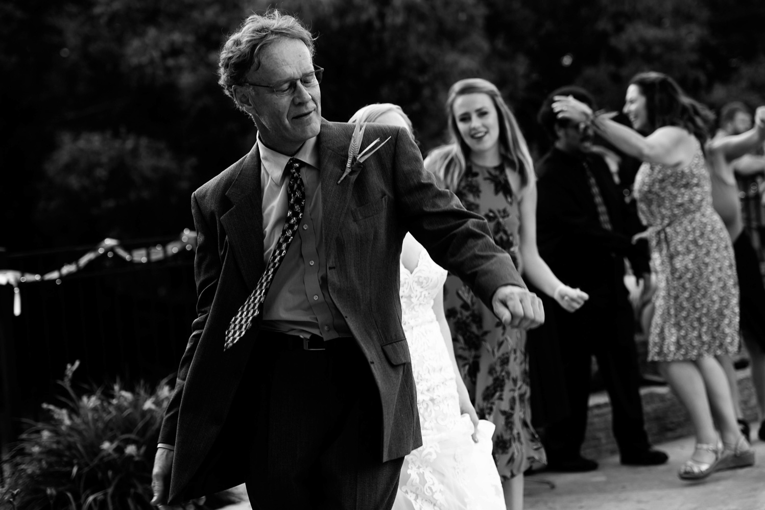 wedding guests doing the conga