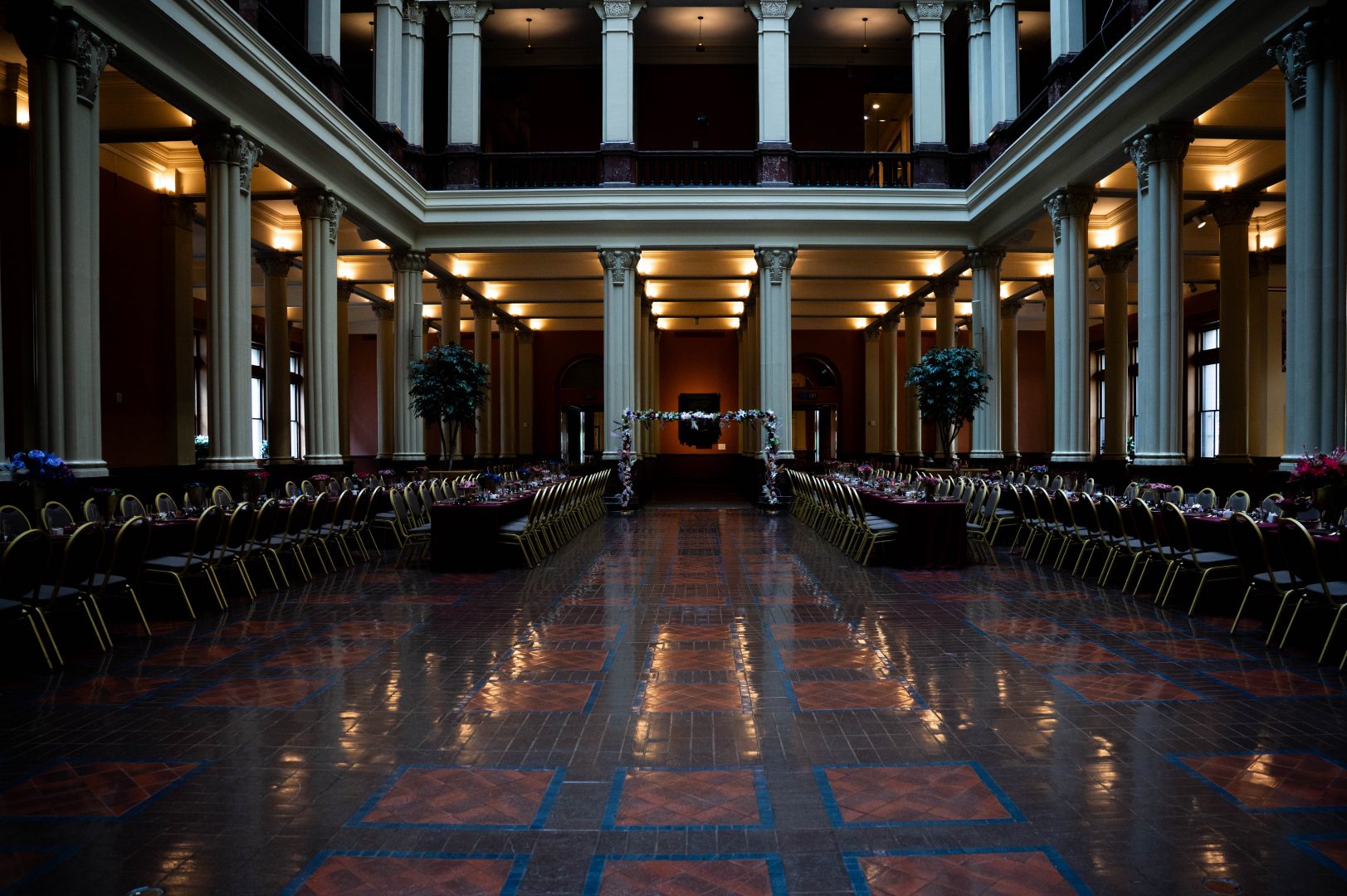 the inside of the landmark center set up for a wedding ceremony