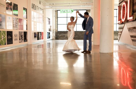 a bride and groom entering their wedding reception at paikka