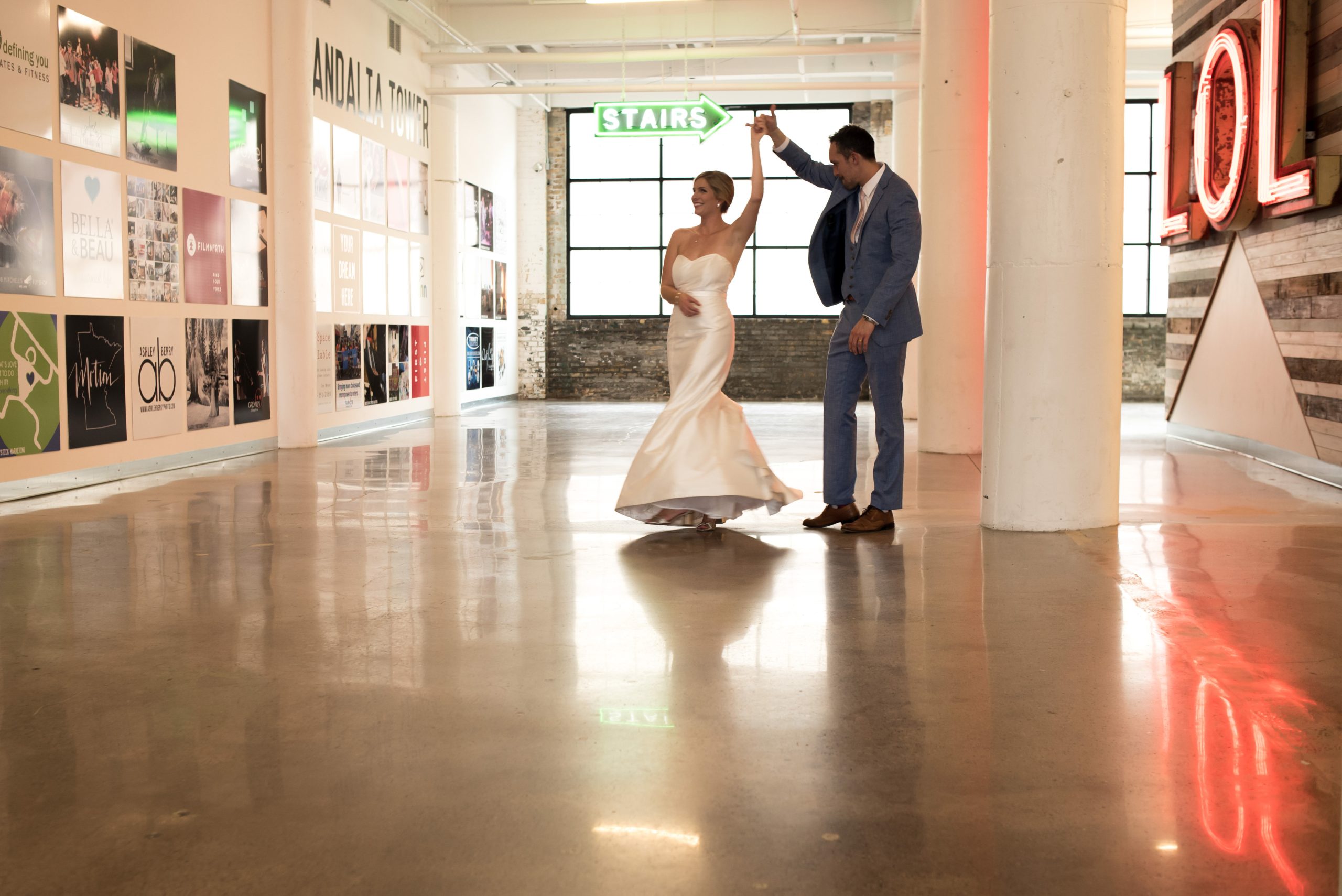 a bride and groom entering their wedding reception at paikka
