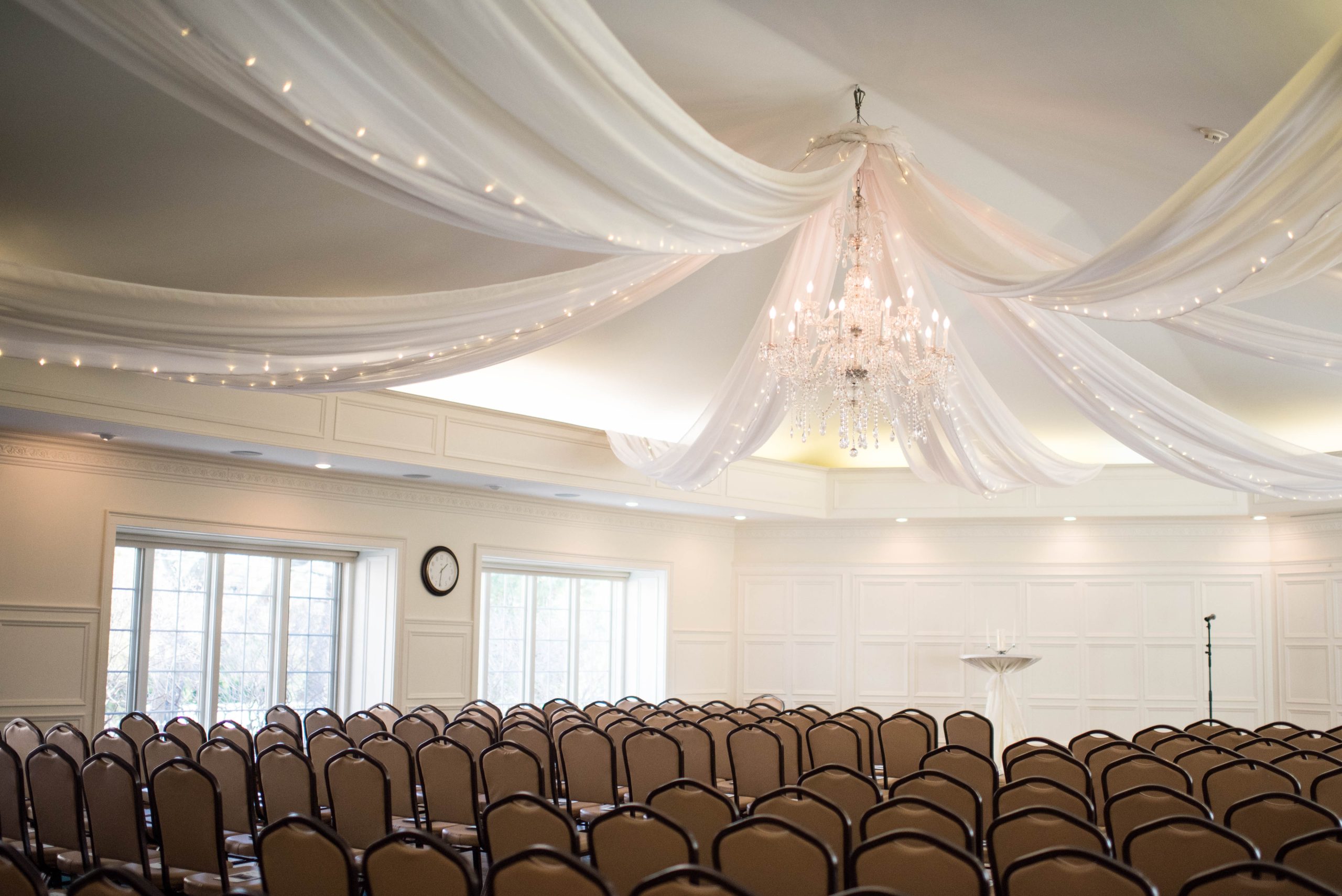 the interior of the Lumber Exchange Event Center set up for a wedding reception